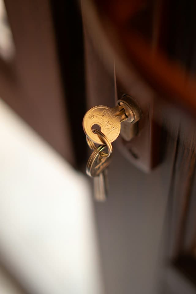 Photo by Dima Solomin on Unsplash - https://unsplash.com/photos/a-close-up-of-a-key-on-a-door-LkoDqb5E3zg?utm_source=unsplash&utm_medium=referral&utm_content=creditCopyText